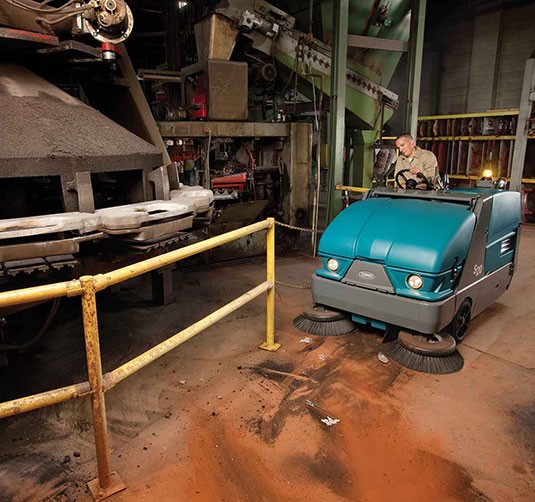 S20 Compact Mid-Sized Rider Sweeper in a manufacturing plant.